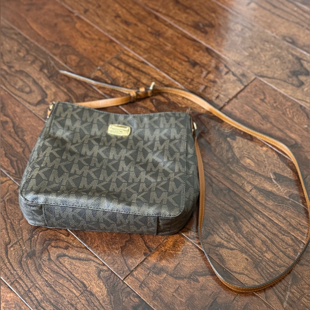 Brown Crossbody Bag. Lightly used. Small, Washable stain inside from lipgloss.